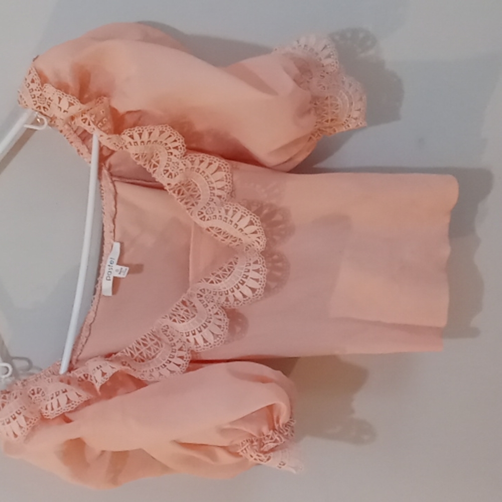 Pastel pink cotton top.